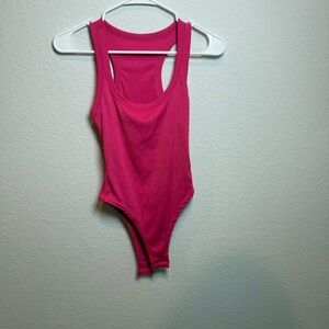 NWOT Pink Woman’s Bodysuit size Large